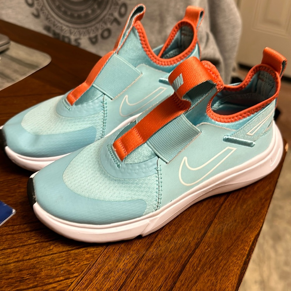 Nike shoes . Girls size 1Y .  Practically new never been worn only tried on .